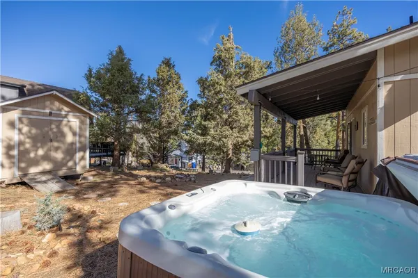 a view of a backyard with a patio