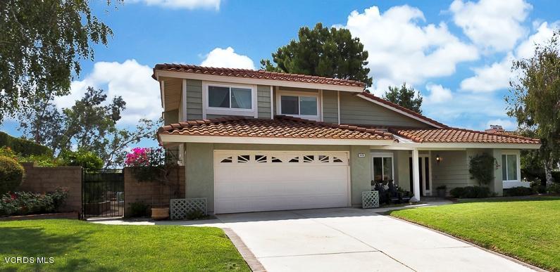 5438 Cochise Street Simi Valley, CA 93063 - Photo 1 of 35 a front view of a house with a yard and a garage