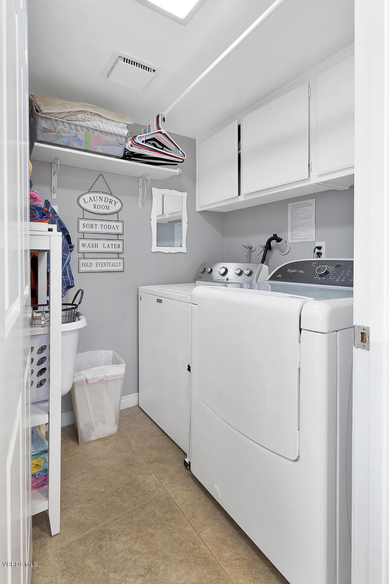 5438 Cochise Street Simi Valley, CA 93063 - Photo 20 of 35 a utility room with closet dryer and washer