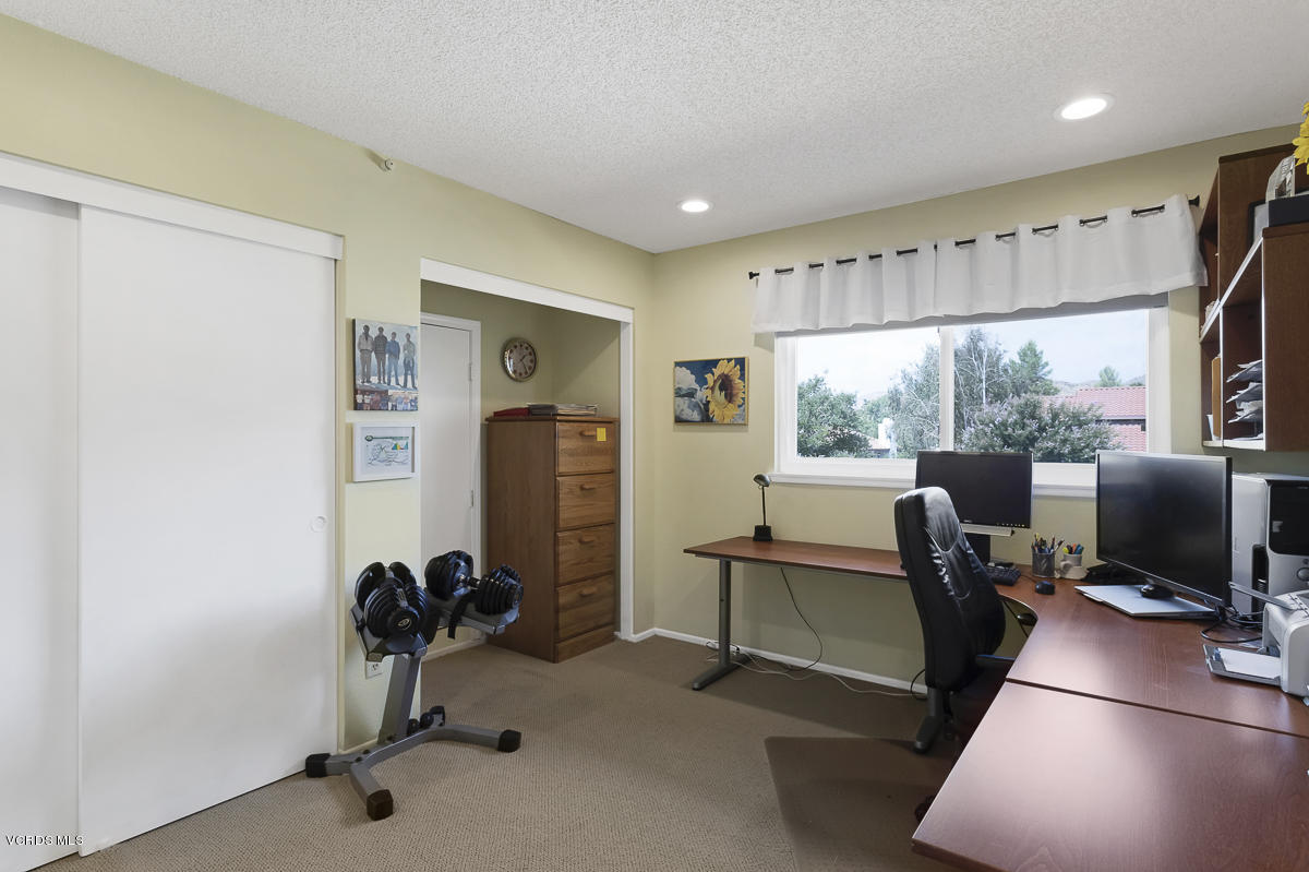 5438 Cochise Street Simi Valley, CA 93063 - Photo 22 of 35 a view of a livingroom with workspace and a window