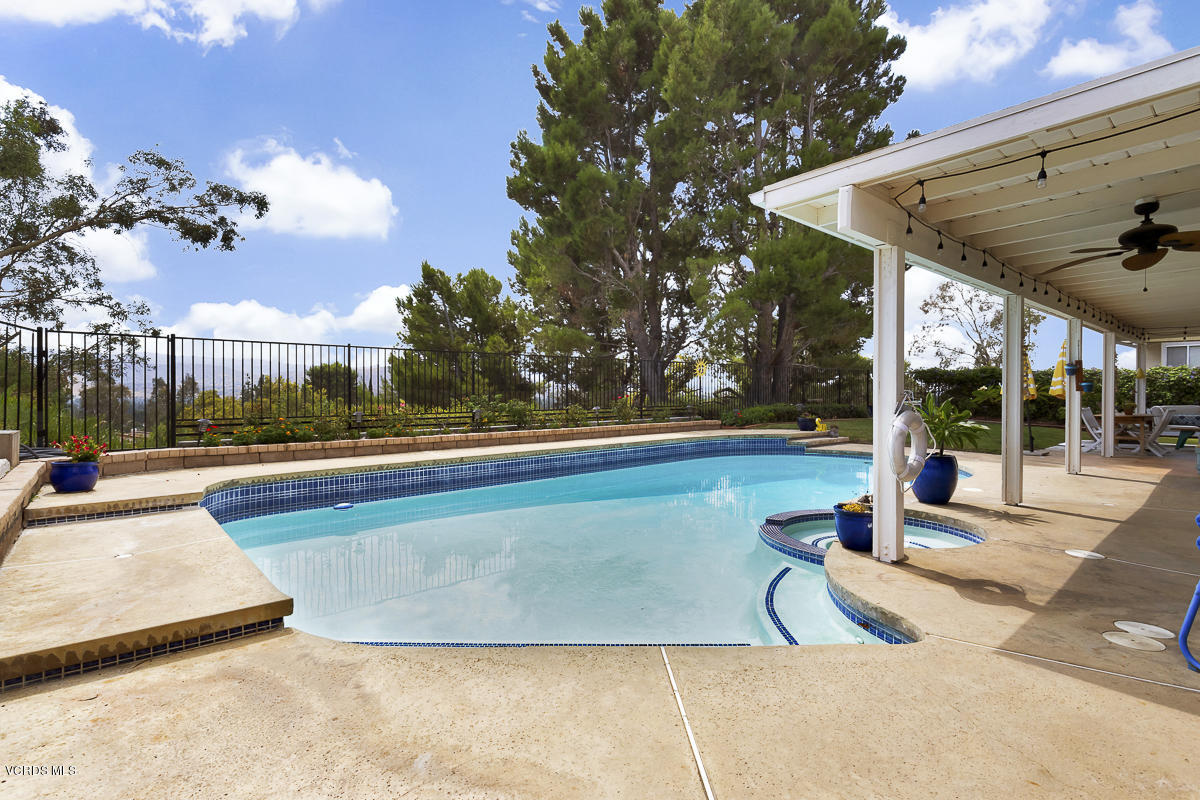 5438 Cochise Street Simi Valley, CA 93063 - Photo 29 of 35 a view of a swimming pool with a patio