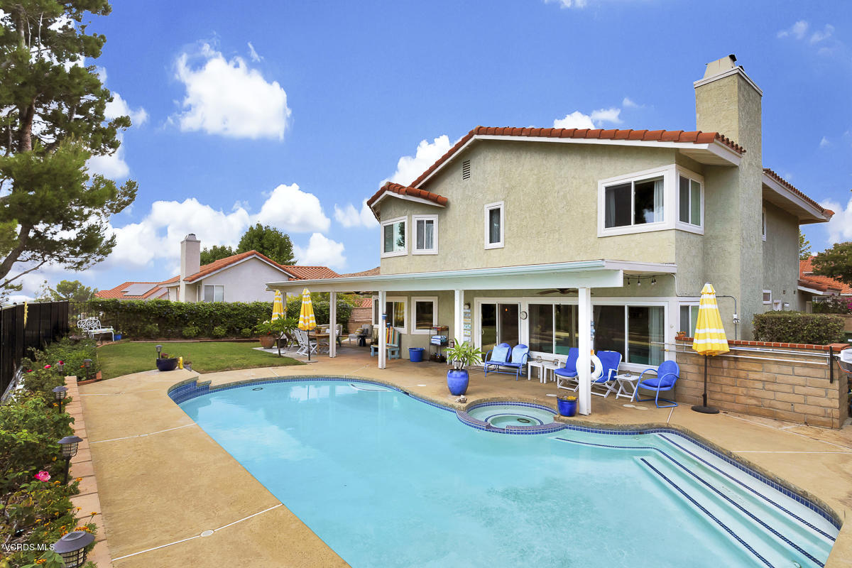 5438 Cochise Street Simi Valley, CA 93063 - Photo 30 of 35 a view of a house with swimming pool having outdoor seating