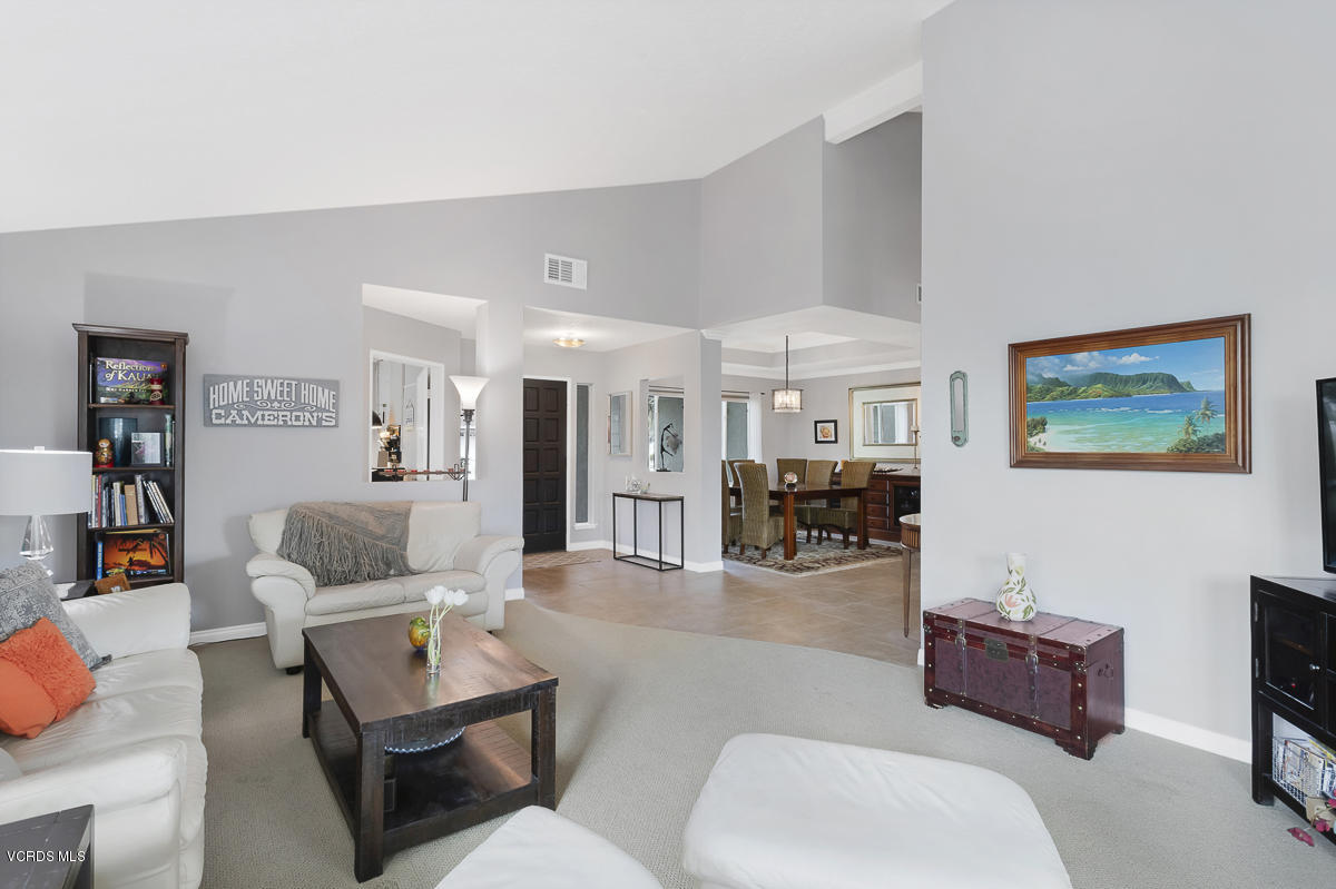 5438 Cochise Street Simi Valley, CA 93063 - Photo 7 of 35 a living room with furniture and a table