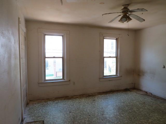 115 Chess Street Monongahela, PA 15063 - Photo 13 of 23 an empty room with windows and fan