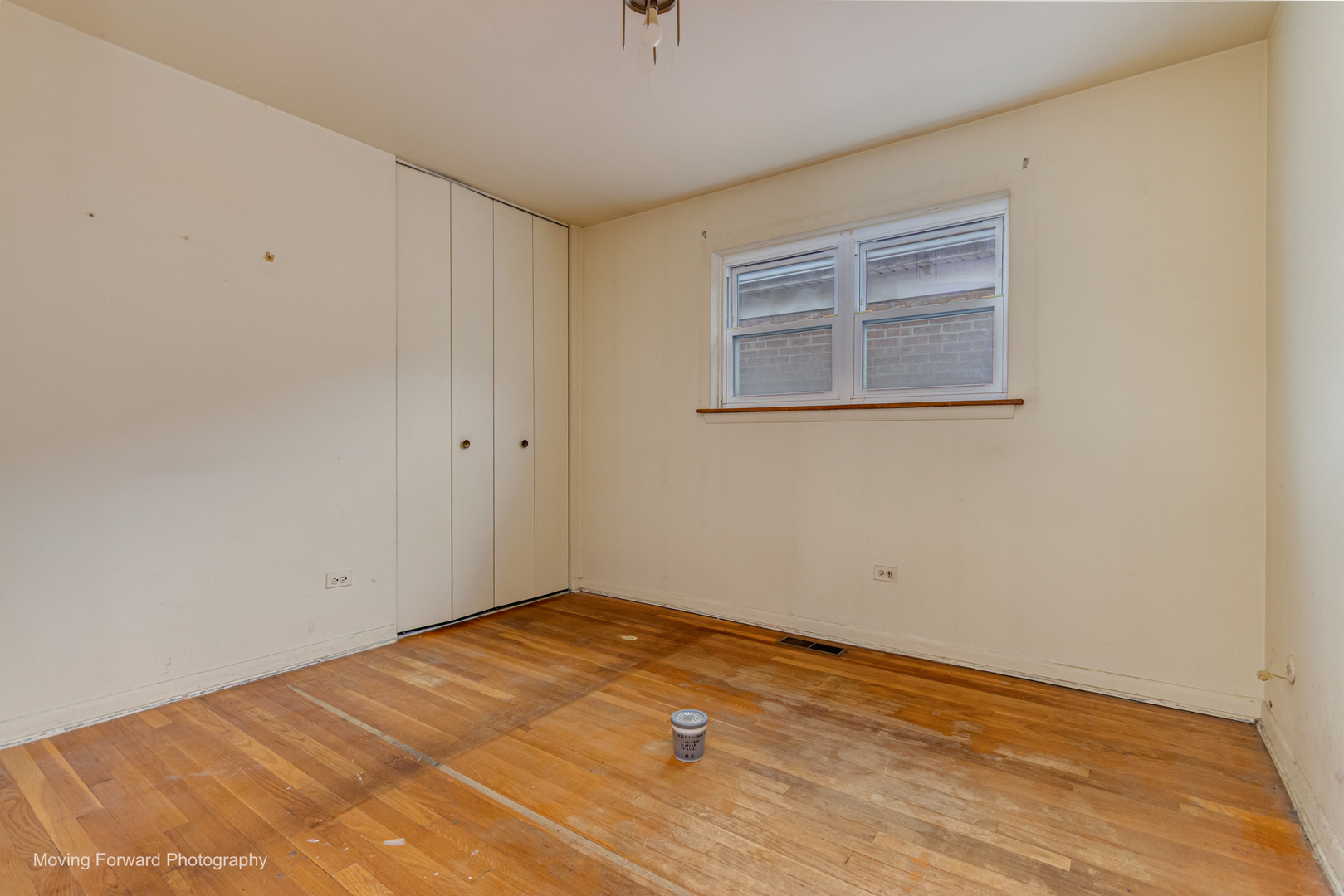 9726 S Lane Chicago, IL 60628 - Photo 13 of 27 a view of empty room with wooden floor