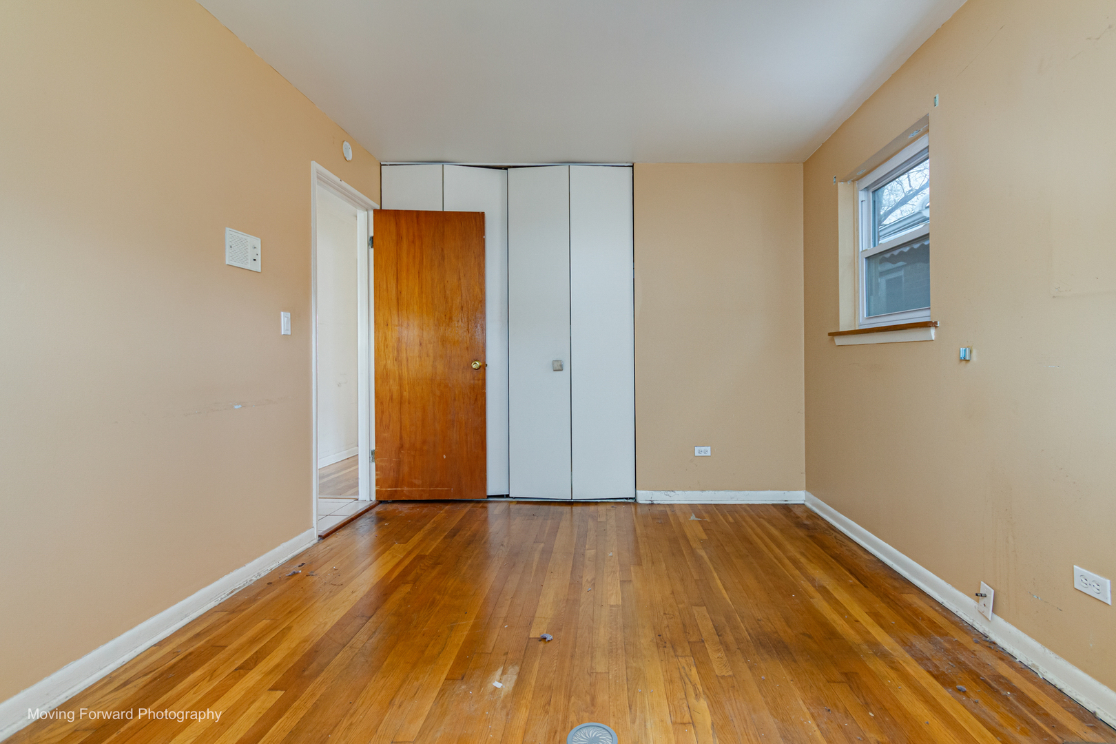 9726 S Lane Chicago, IL 60628 - Photo 16 of 27 a view of a room with wooden floor