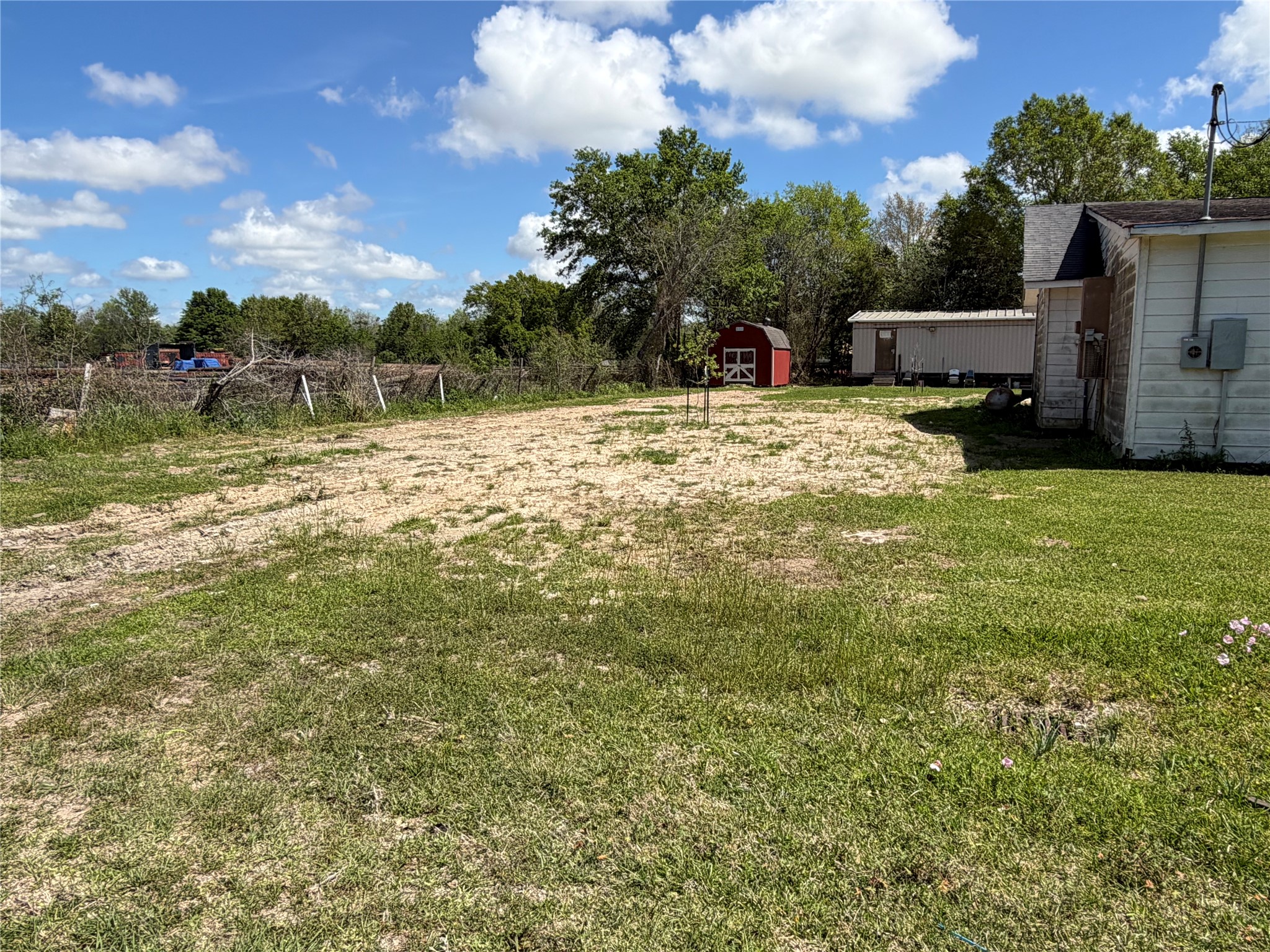 26630 Betka Road Hockley, TX 77447 - Photo 10 of 11 a view of a house with a yard