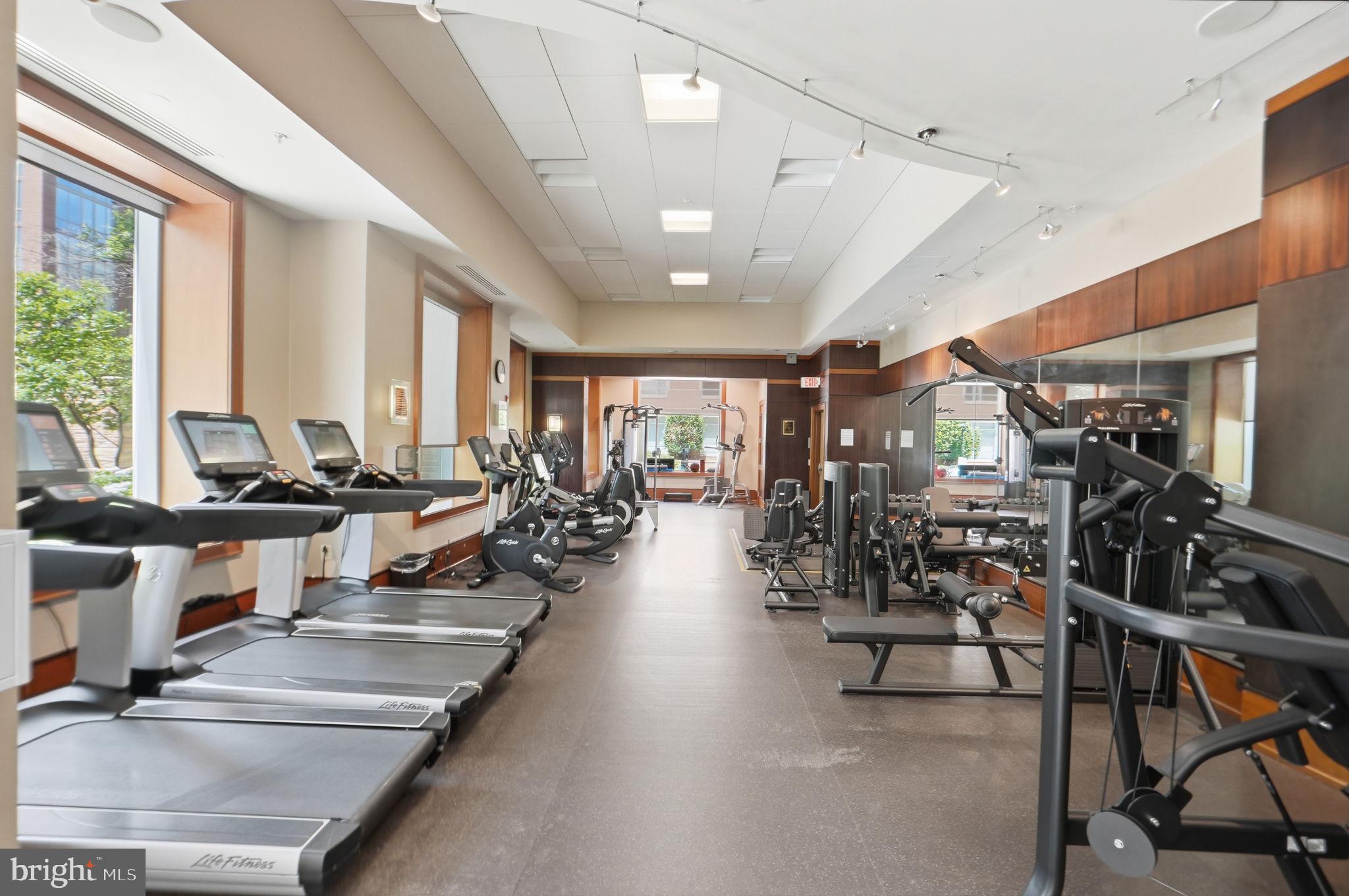 11990 Market Street, Unit 2103 Reston, VA 20190 - Photo 54 of 78 Modern fitness center with sleek equipment.