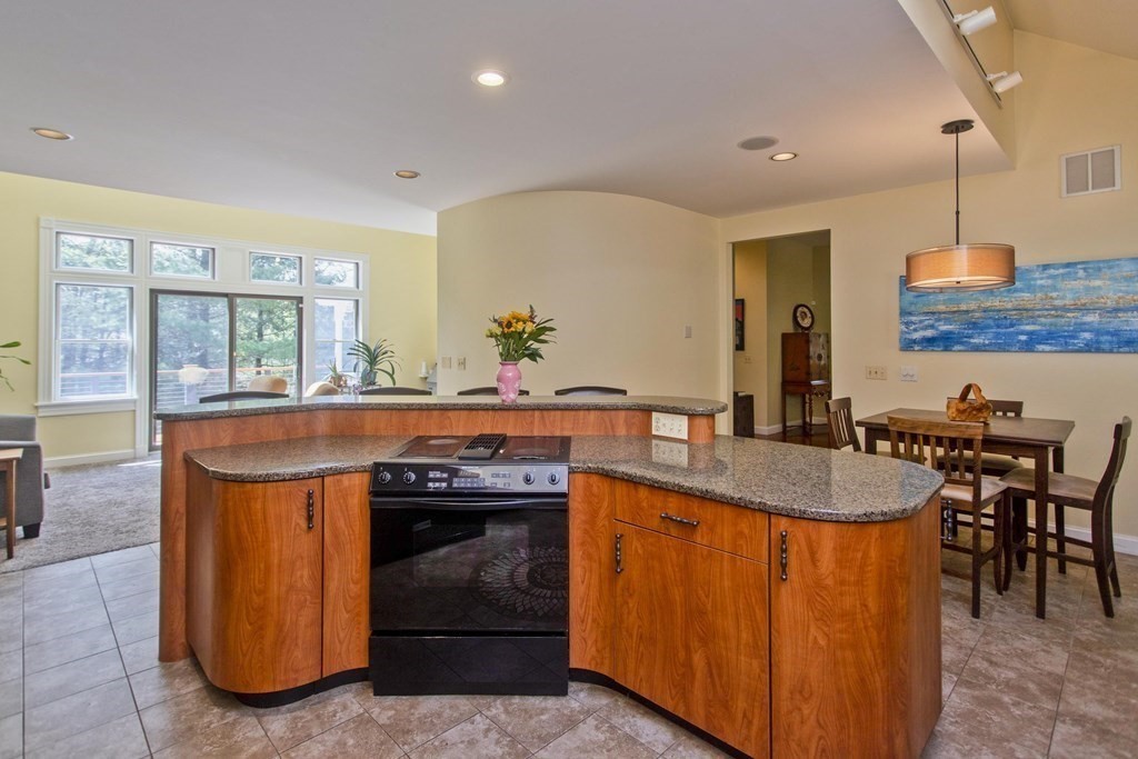 31 Rustlewood Ridge Northampton, MA 01062 - Photo 11 of 42 a kitchen with stainless steel appliances granite countertop a stove and a sink