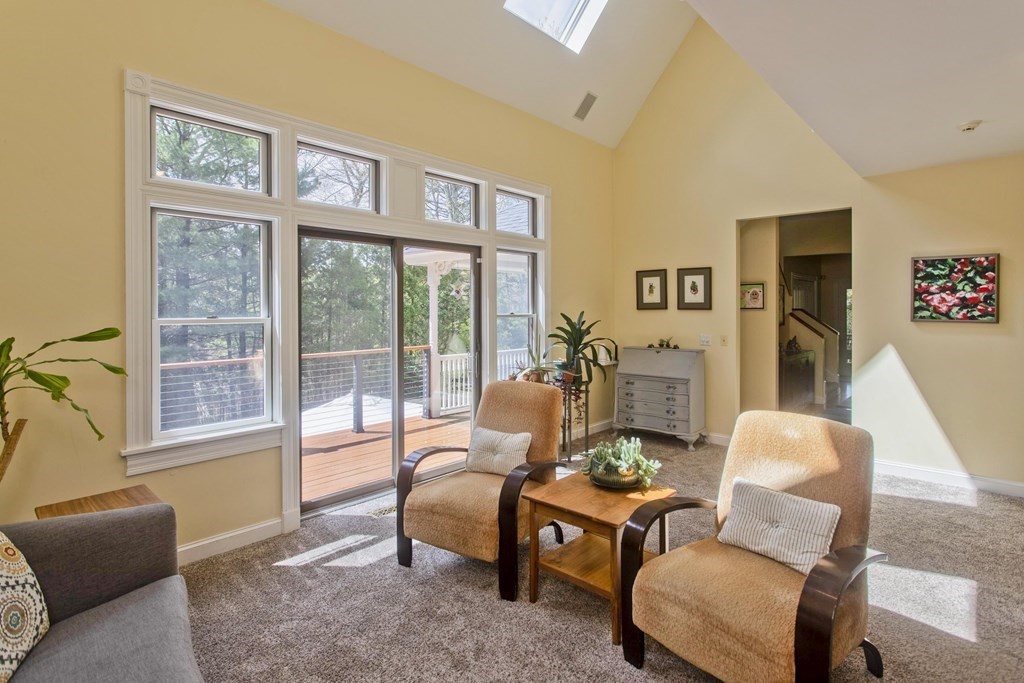 31 Rustlewood Ridge Northampton, MA 01062 - Photo 13 of 42 a living room with furniture and a large window