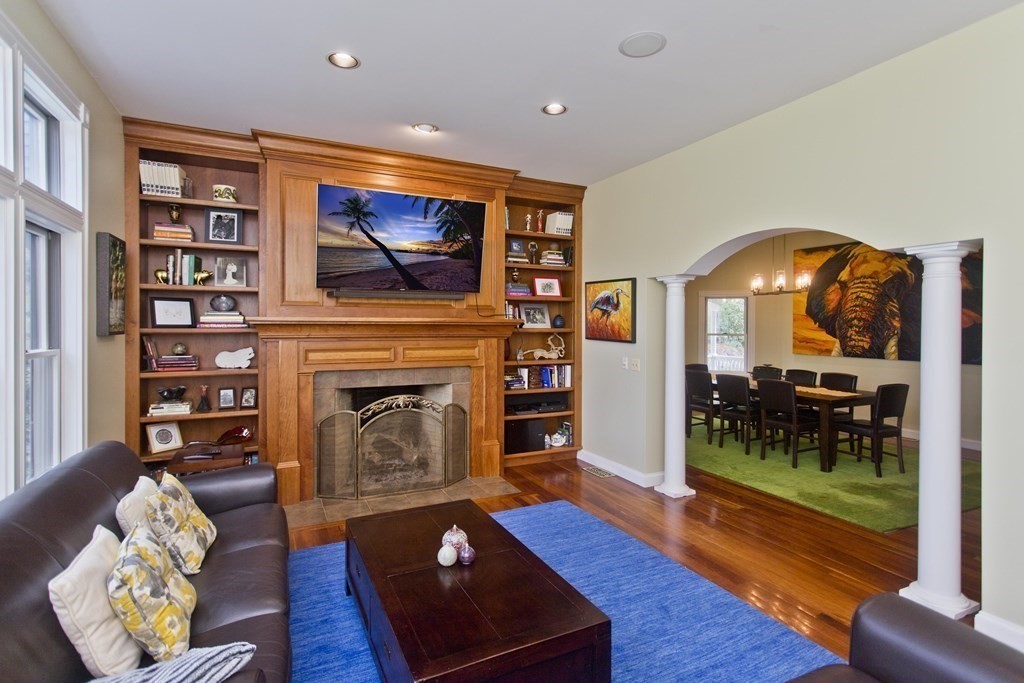 31 Rustlewood Ridge Northampton, MA 01062 - Photo 16 of 42 a living room with furniture and a fireplace