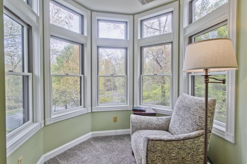 31 Rustlewood Ridge Northampton, MA 01062 - Photo 23 of 42 a living room with furniture and a large window