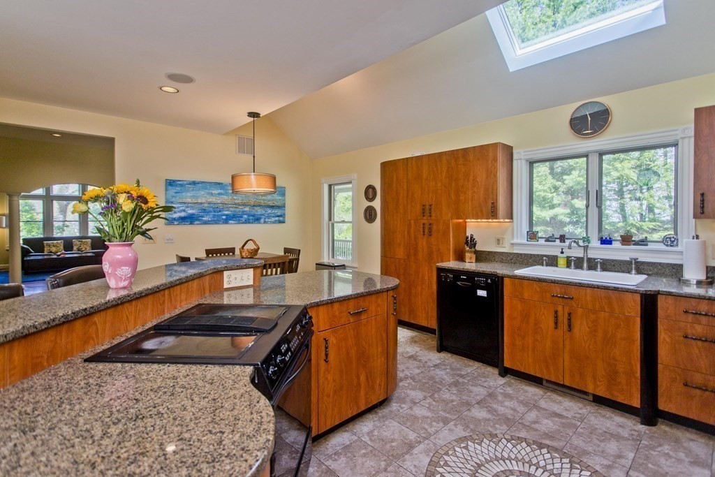 31 Rustlewood Ridge Northampton, MA 01062 - Photo 10 of 42 a large kitchen with kitchen island a large window in it