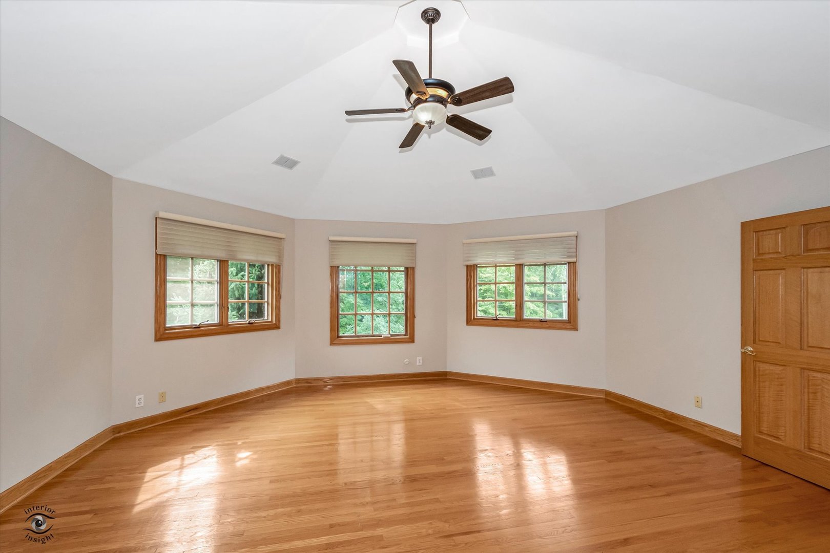 20841 Wolf Road Mokena, IL 60448 - Photo 27 of 40 a view of empty room with wooden floor and fan