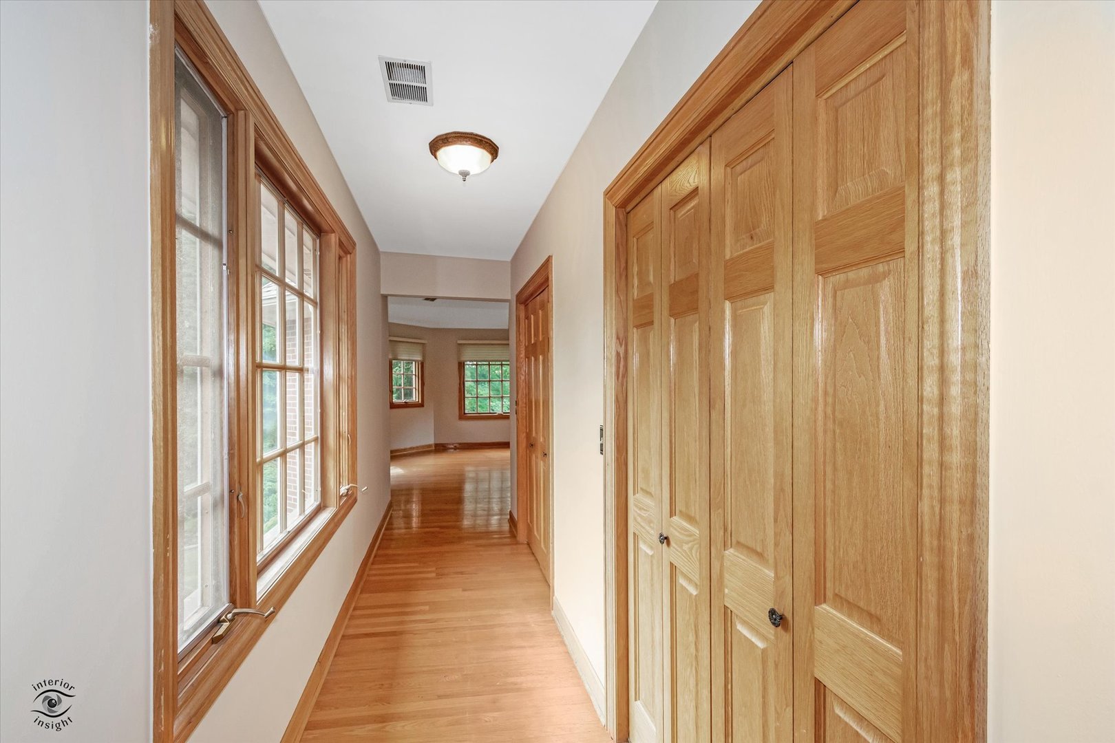 20841 Wolf Road Mokena, IL 60448 - Photo 28 of 40 a view of a large room with wooden floor and windows
