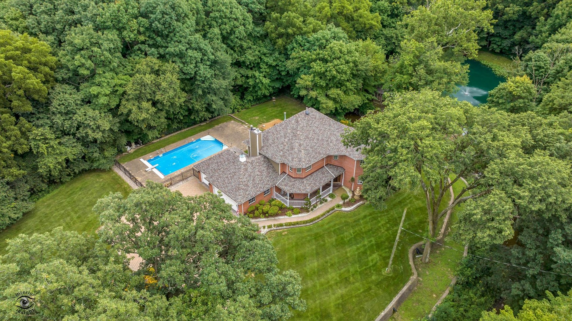 20841 Wolf Road Mokena, IL 60448 - Photo 3 of 40 an aerial view of a house with swimming pool and garden