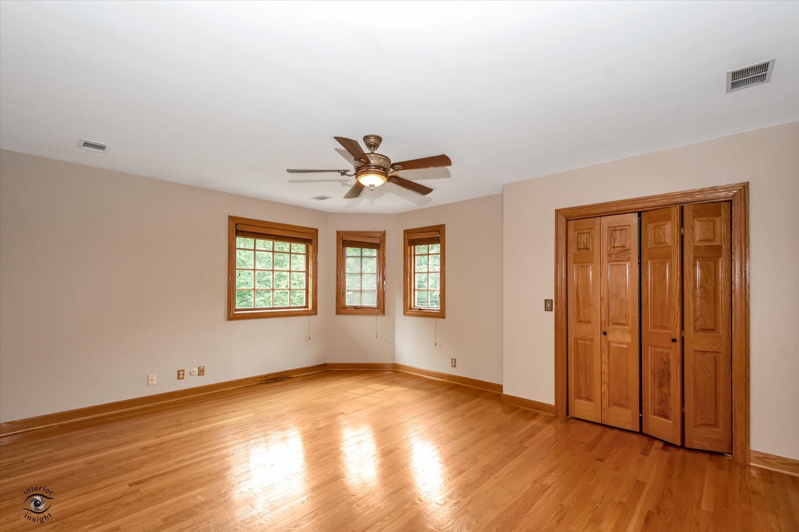 20841 Wolf Road Mokena, IL 60448 - Photo 33 of 40 a view of empty room with wooden floor and fan