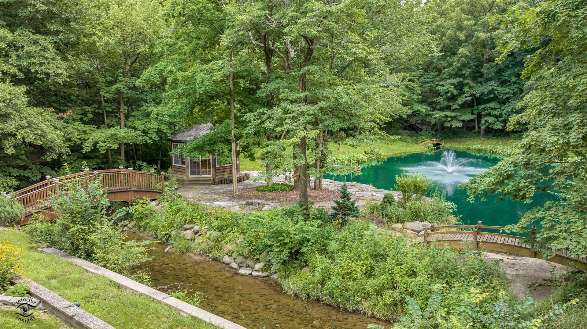 20841 Wolf Road Mokena, IL 60448 - Photo 9 of 40 a view of a garden with plants and large trees