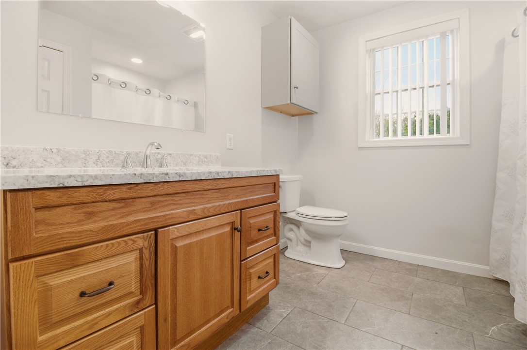 5 Village Road Warren, RI 02885 - Photo 14 of 26 Second bathroom,tub w/shower, double sink