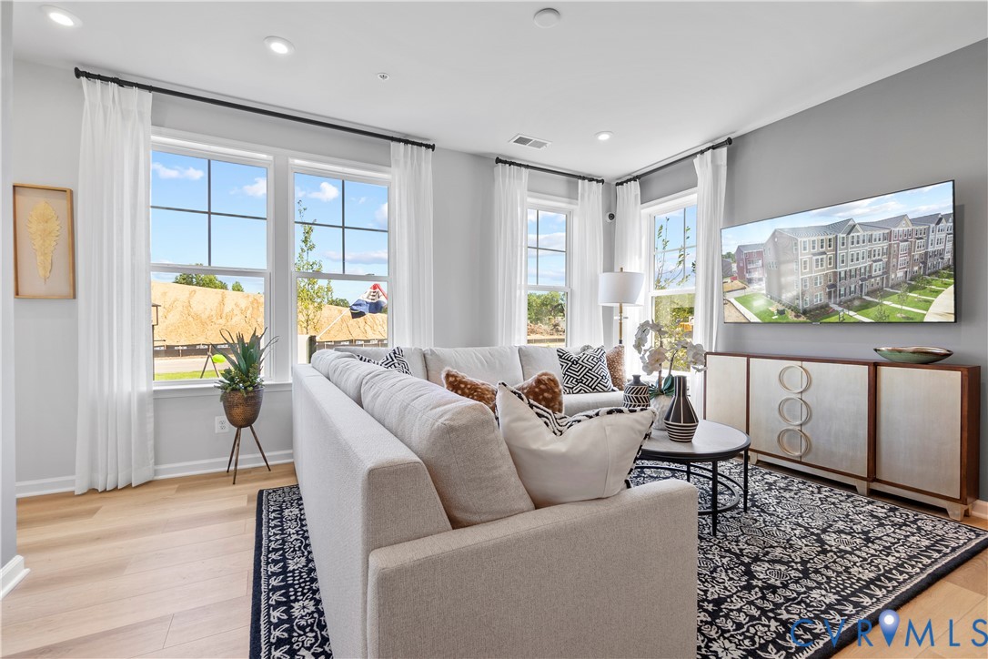 3609 Edna Path, Unit A Richmond, VA 23233 - Photo 9 of 26 a living room with furniture and a large window