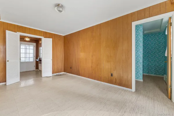 a bathroom with a sink toilet and a mirror