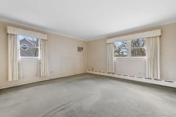 an empty room with windows