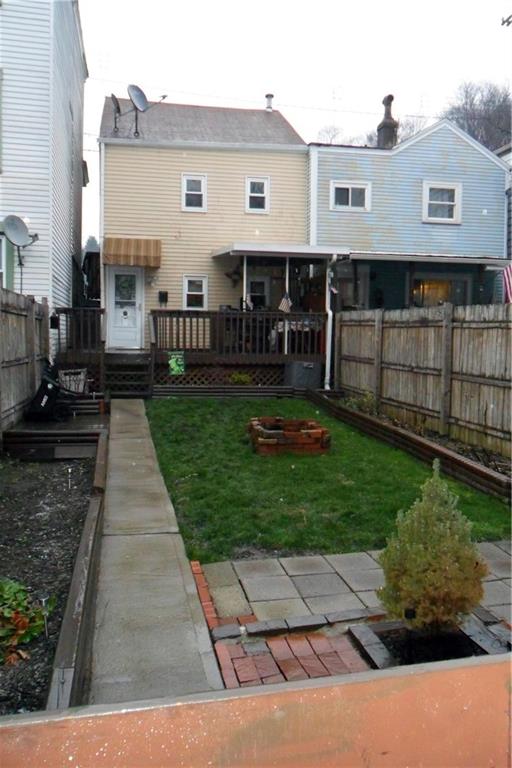 539 Evergreen Road Millvale, PA 15209 - Photo 2 of 11 View from carport toward rear of house.