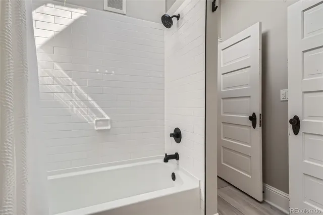 a bathroom with a bathtub