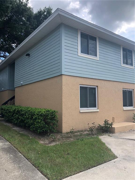 540 Golden Raintree Place, Unit 540 Brandon, FL 33510 - Photo 1 of 1 a backyard of a house with lots of green space
