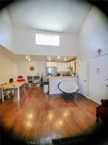 a kitchen with a refrigerator a stove top oven a sink and dishwasher