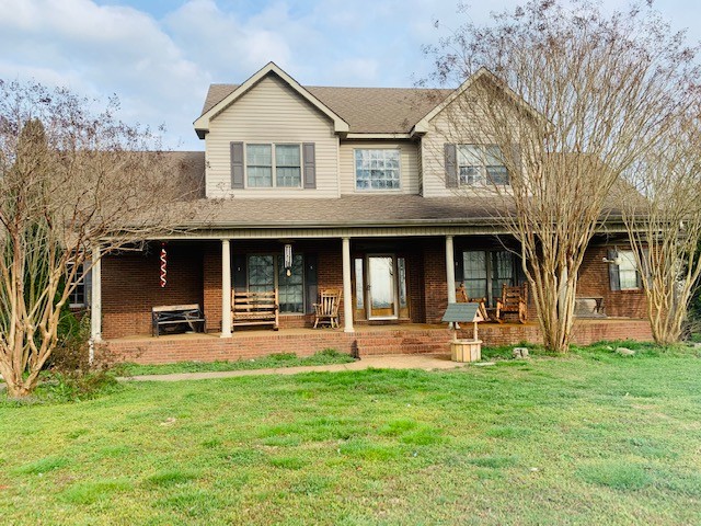 14 North George Road Flintville, TN 37335 - Photo 1 of 48 front view of a house with a yard