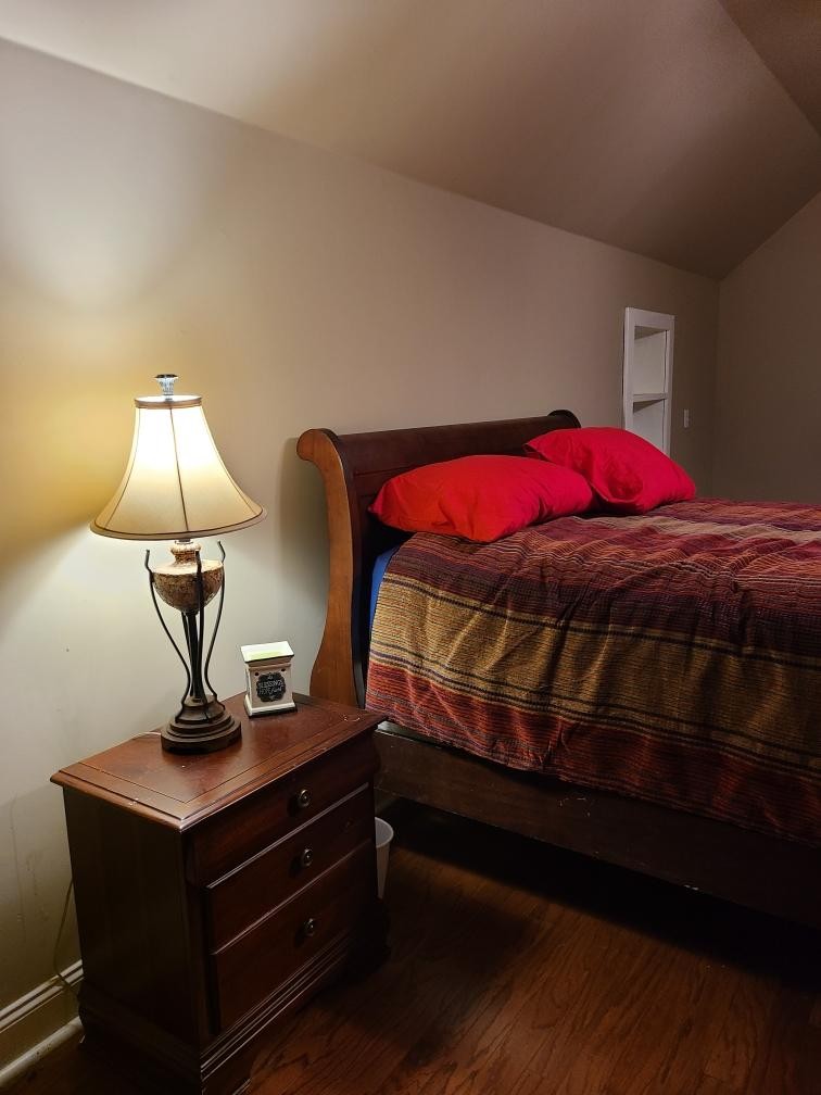 14 North George Road Flintville, TN 37335 - Photo 26 of 48 a bedroom with a bed and a lamp on table