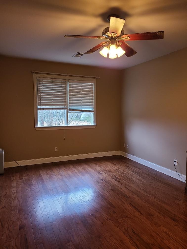 14 North George Road Flintville, TN 37335 - Photo 31 of 48 a view of an empty room with wooden floor and a window