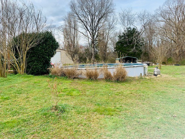14 North George Road Flintville, TN 37335 - Photo 35 of 48 a view of a backyard with large trees