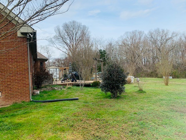 14 North George Road Flintville, TN 37335 - Photo 5 of 48 a view of a backyard with large trees
