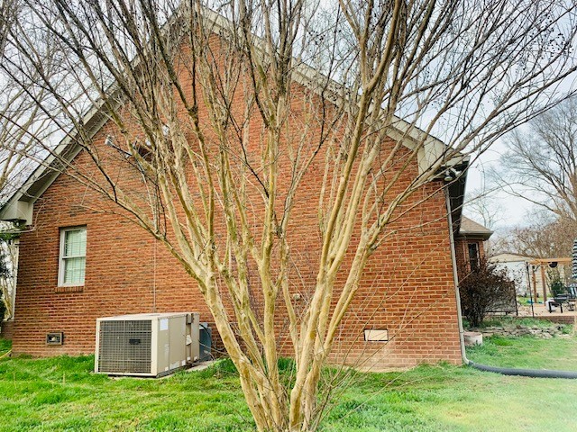 14 North George Road Flintville, TN 37335 - Photo 6 of 48 a brick building with a yard