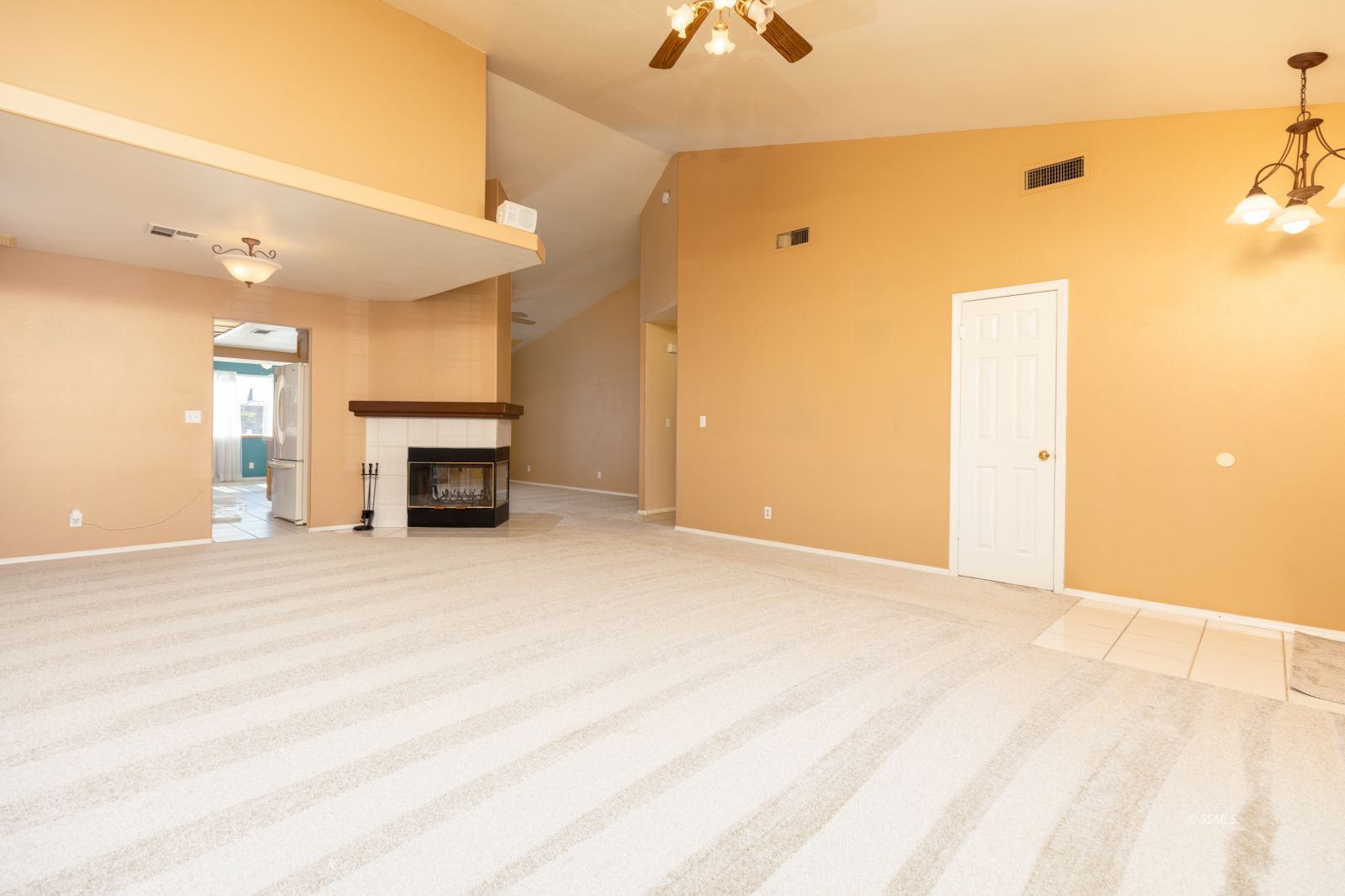1225 Andrea Court Ridgecrest, CA 93555 - Photo 9 of 46 a view of empty room with a fireplace
