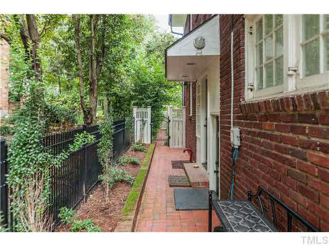 303 Hawthorne Road Raleigh, NC 27605 - Photo 22 of 25 This back garden area is fenced, so pets that need to go out have a safe place to play.