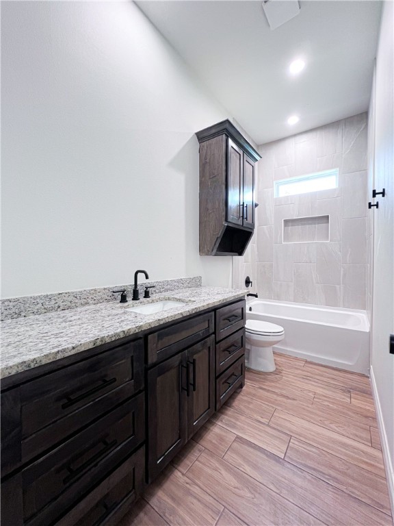 6918 Pacific Way Corpus Christi, TX 78414 - Photo 14 of 34 a spacious bathroom with a granite countertop sink toilet a mirror and bathtub