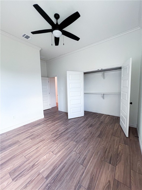 6918 Pacific Way Corpus Christi, TX 78414 - Photo 17 of 34 a view of empty room with wooden floor