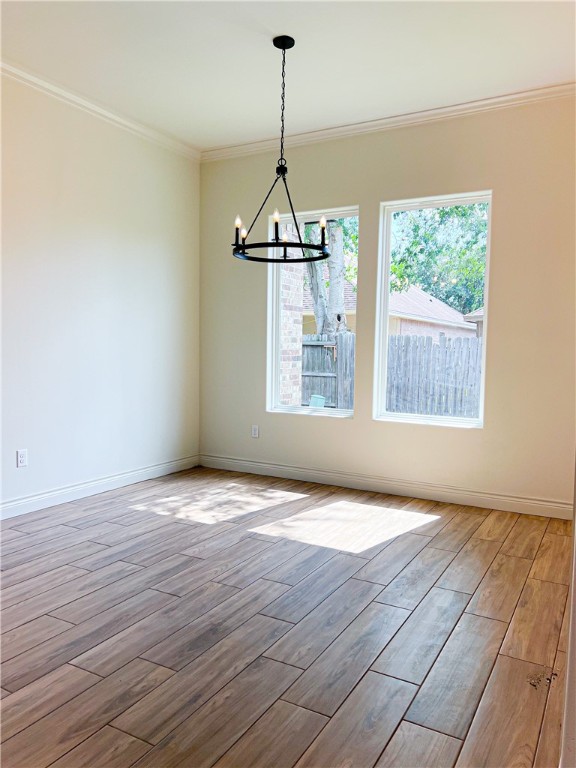 6918 Pacific Way Corpus Christi, TX 78414 - Photo 28 of 34 a view of an empty room with wooden floor and a window