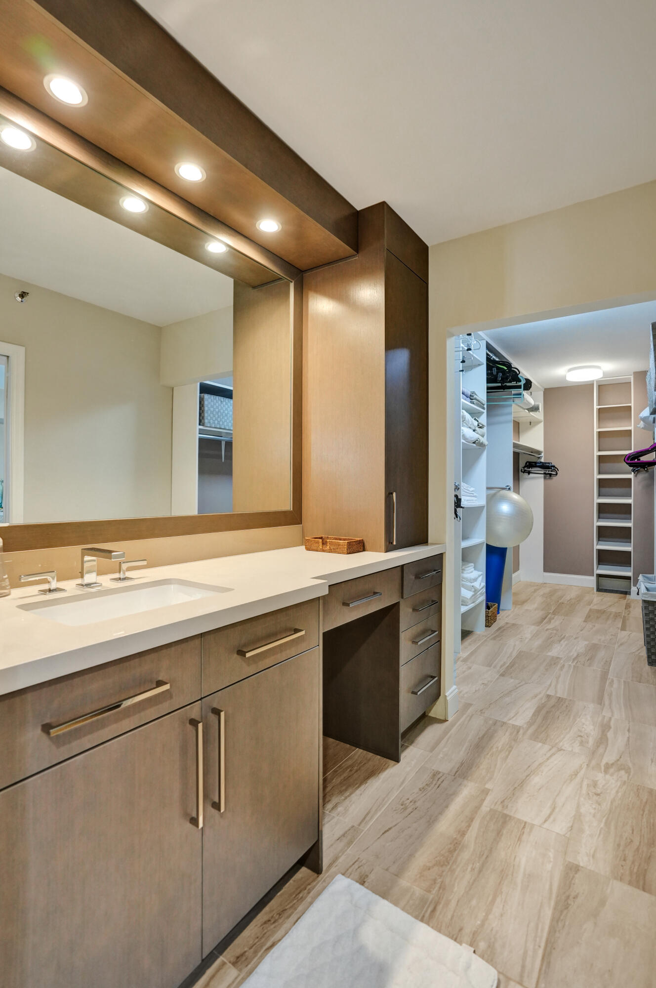 100 Southeast 5th Avenue, Unit 406 Boca Raton, FL 33432 - Photo 14 of 34 a spacious bathroom with a sink and a large mirror