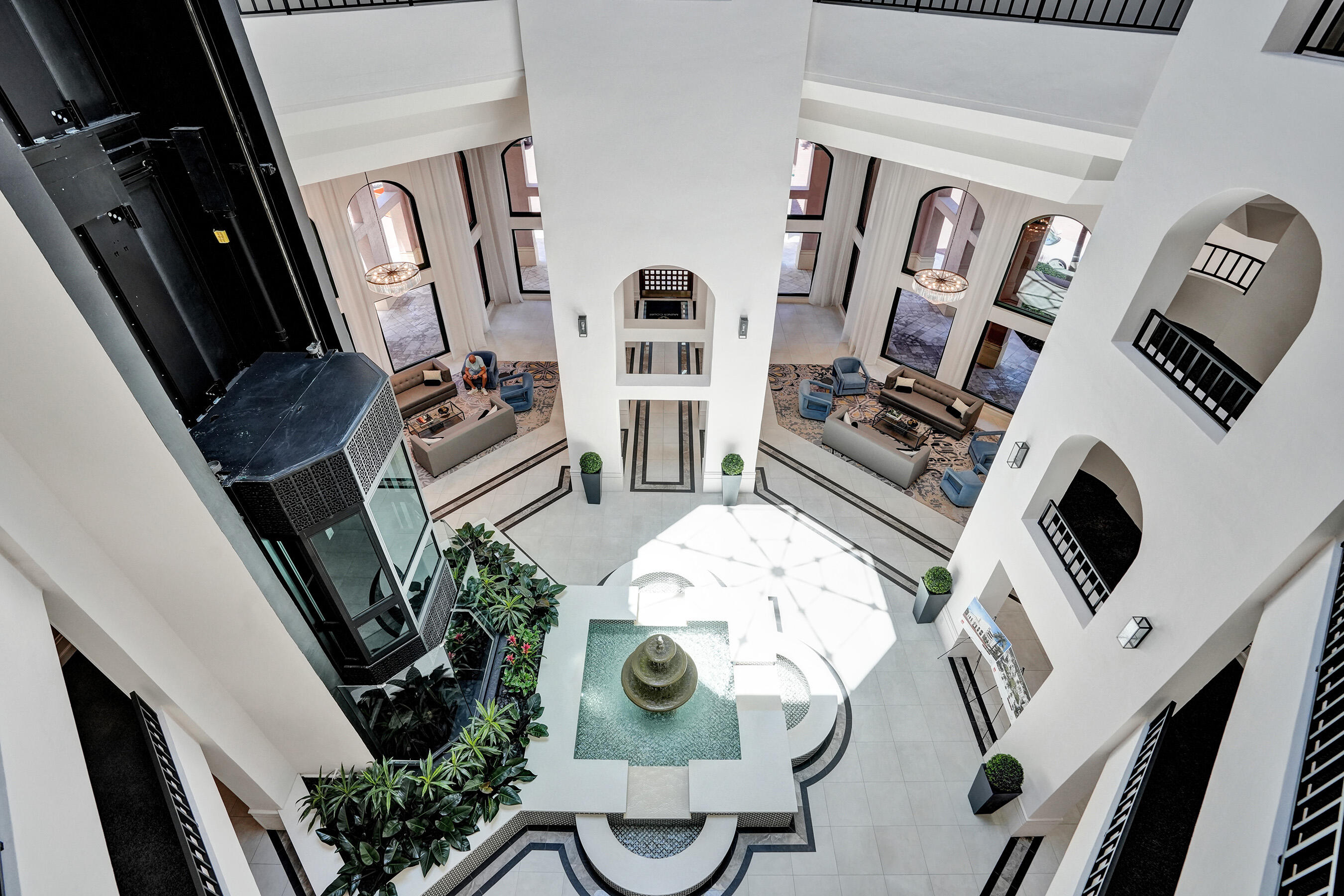 100 Southeast 5th Avenue, Unit 406 Boca Raton, FL 33432 - Photo 24 of 34 a view of living room with furniture and a flat screen tv