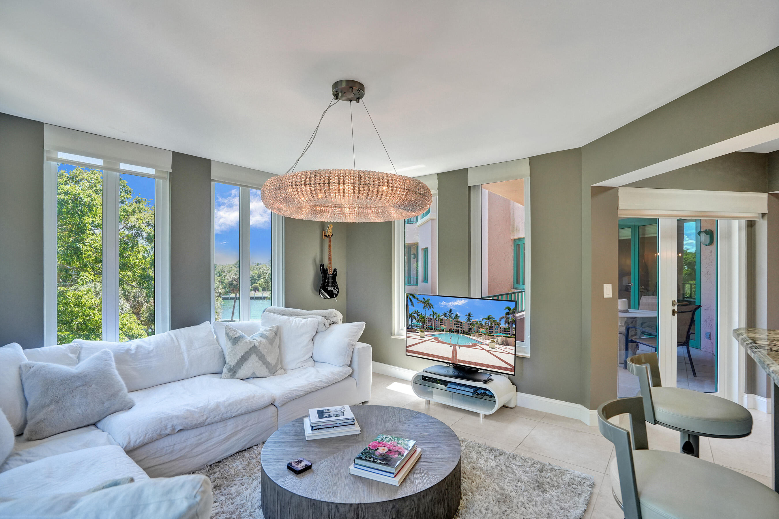 100 Southeast 5th Avenue, Unit 406 Boca Raton, FL 33432 - Photo 3 of 34 a living room with furniture and a large window