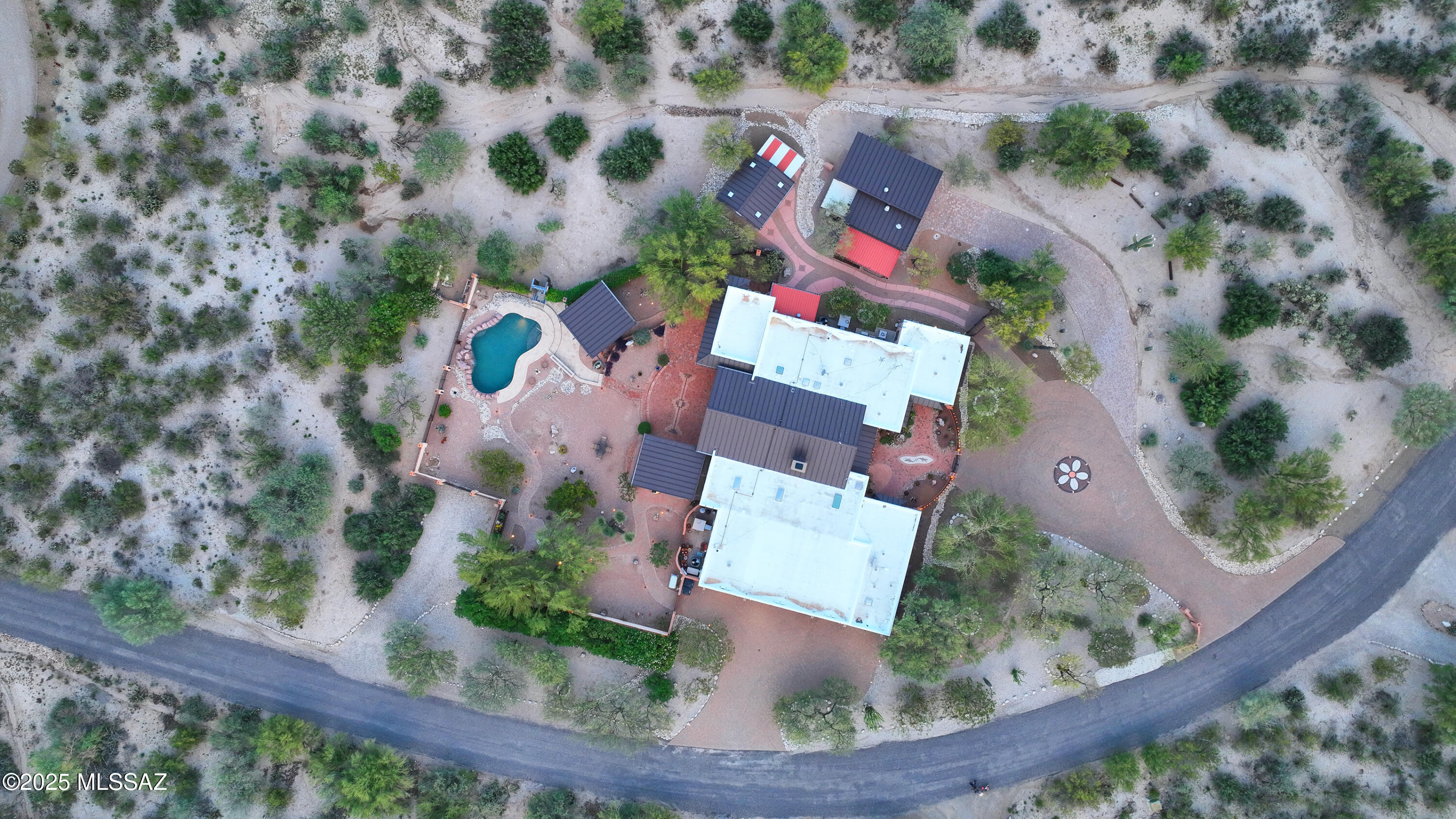 925 North Rancho Del Jefe Loop Tucson, AZ 85748 - Photo 49 of 52 an aerial view of a house with a yard