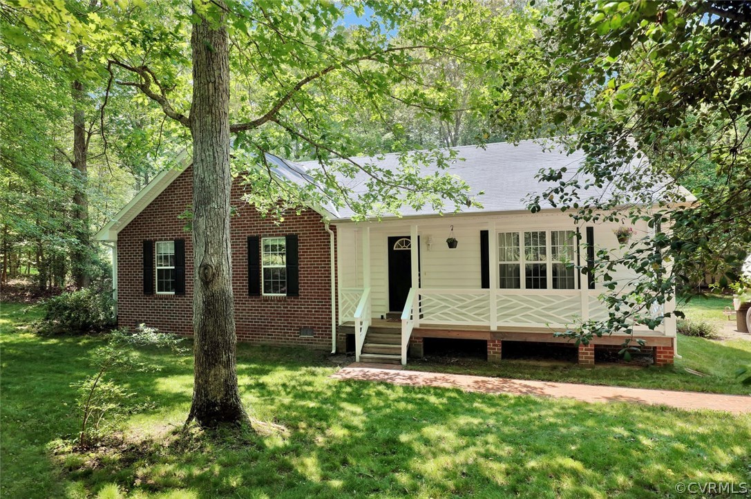10920 Qualla Road Chesterfield, VA 23832 - Photo 2 of 20 a front view of house with yard and green space