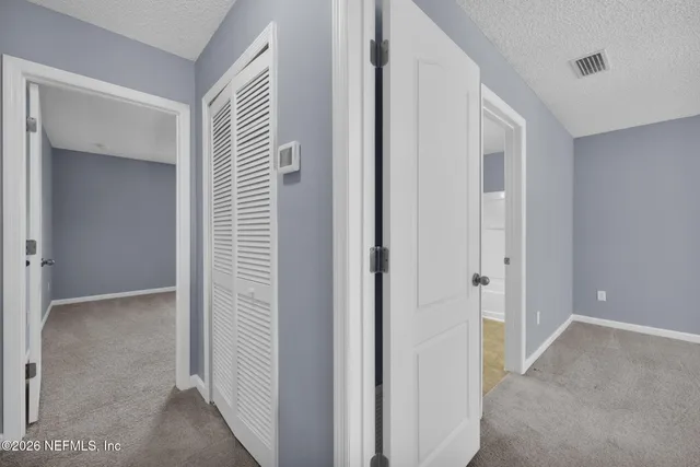 a view of a kitchen with a sink