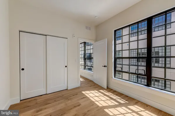 a view of an empty room and window