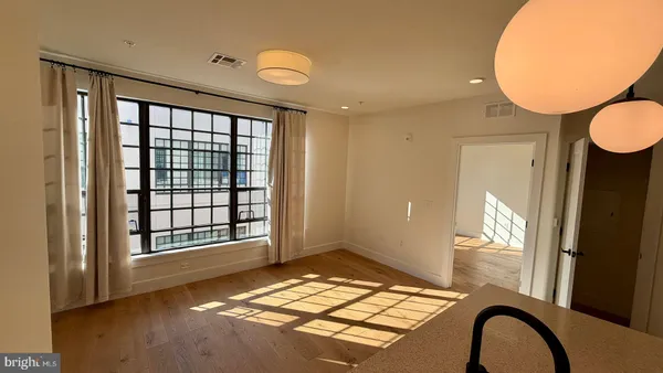 a view of an empty room and window