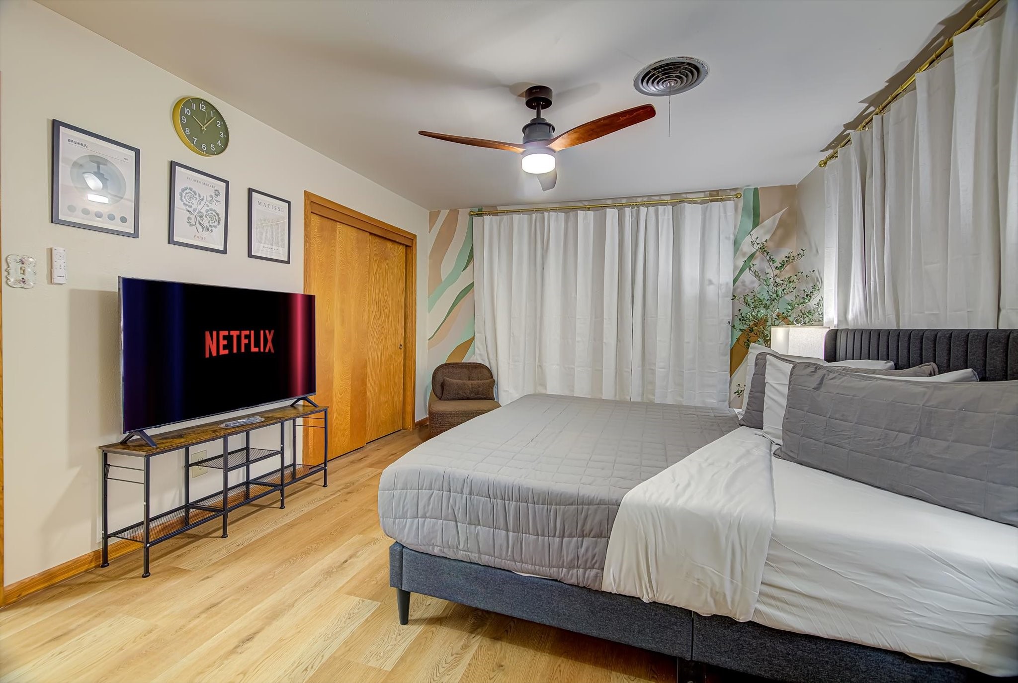 9825 Radio Road Houston, TX 77075 - Photo 18 of 50 a bedroom with a bed and a flat screen tv